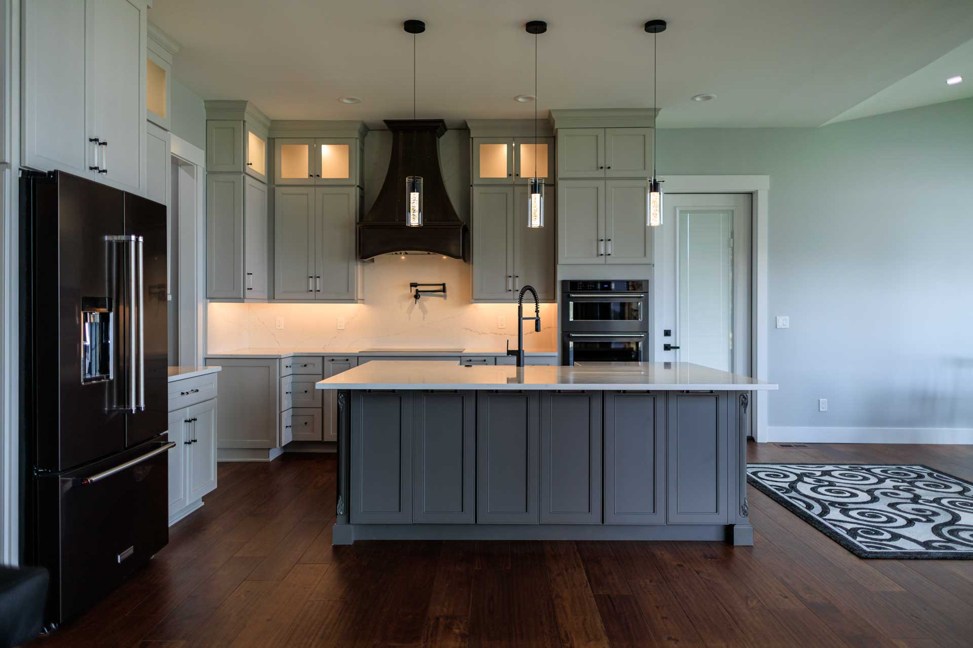 Woodline Building Company Modern Lakefront Lake Nepessing Lapeer, Michigan Kitchen with Modern Pendant Lights
